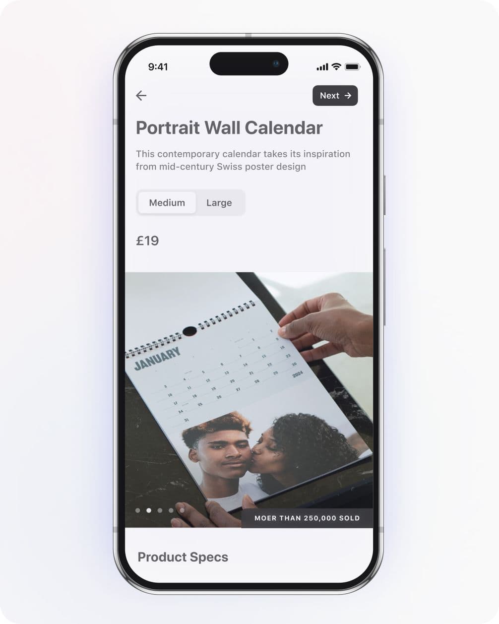 Smartphone displaying a portrait wall calendar app, showing a January page with a couple's photo. Options for medium or large size, priced at £19.