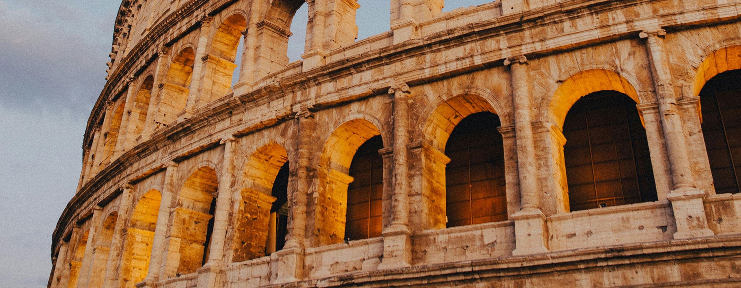 The Roman Colosseum with a dark grey sky behind it