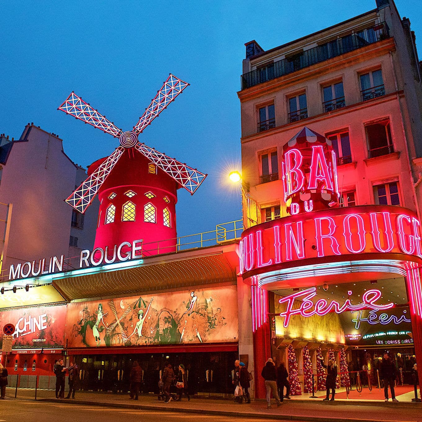 The famous Moulin Rouge cabaret venue lit up at night, Paris, France