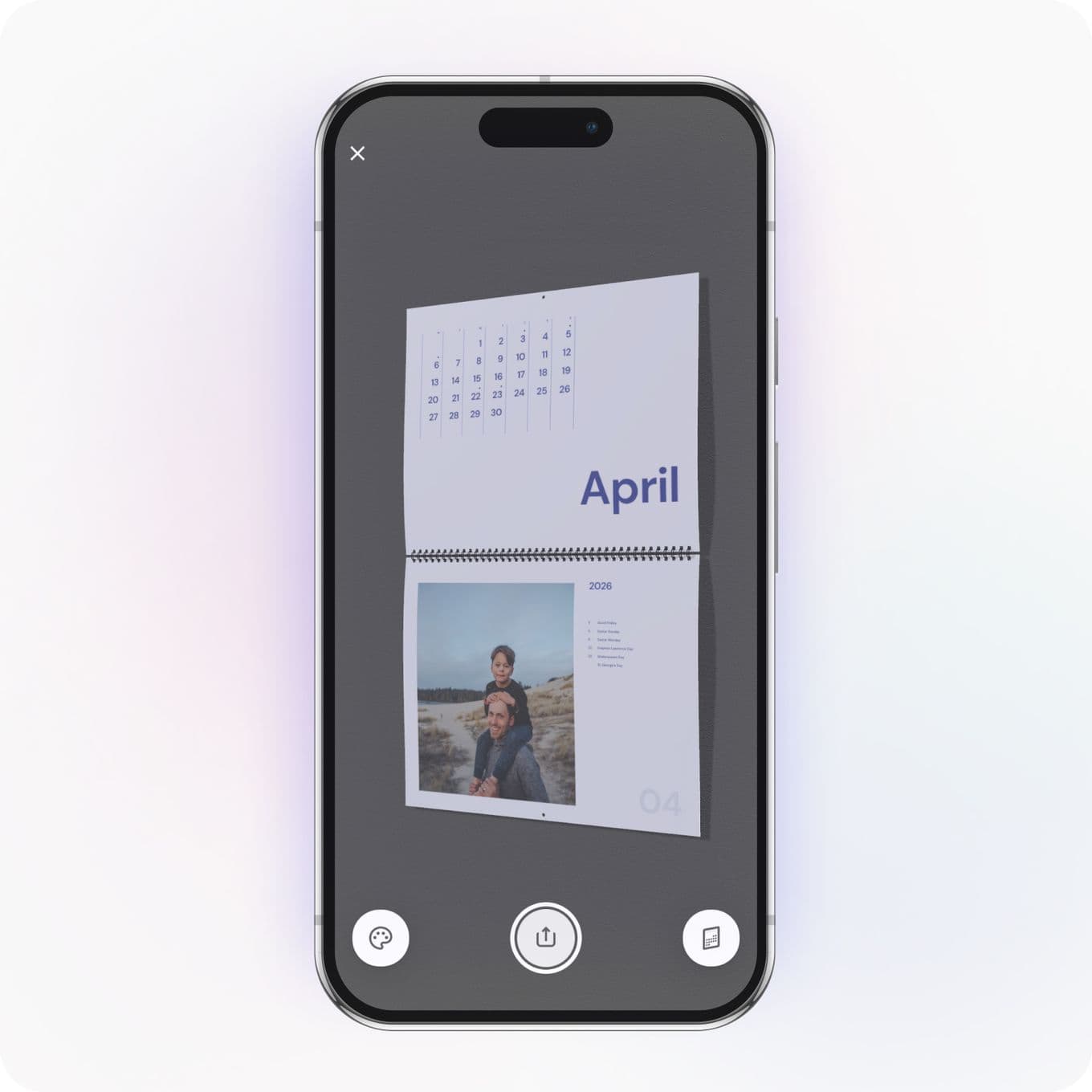Smartphone displaying a calendar app showing April, with a photo of two people outdoors on the screen.