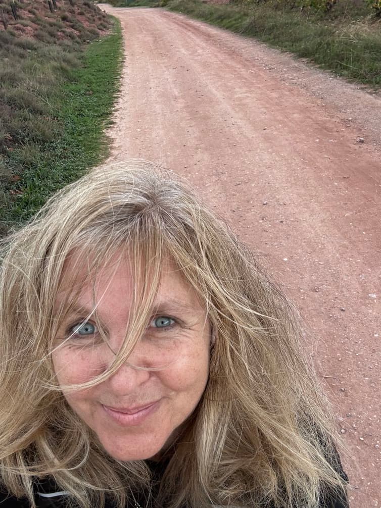 Selfie of travel and copy writer Laurence Millar on dirt road