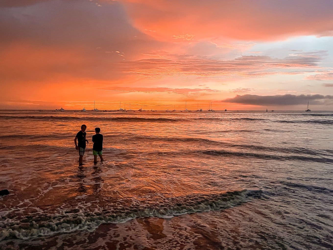 Children in the sea in Tamarindo, Costa Rica, at Golden Hour