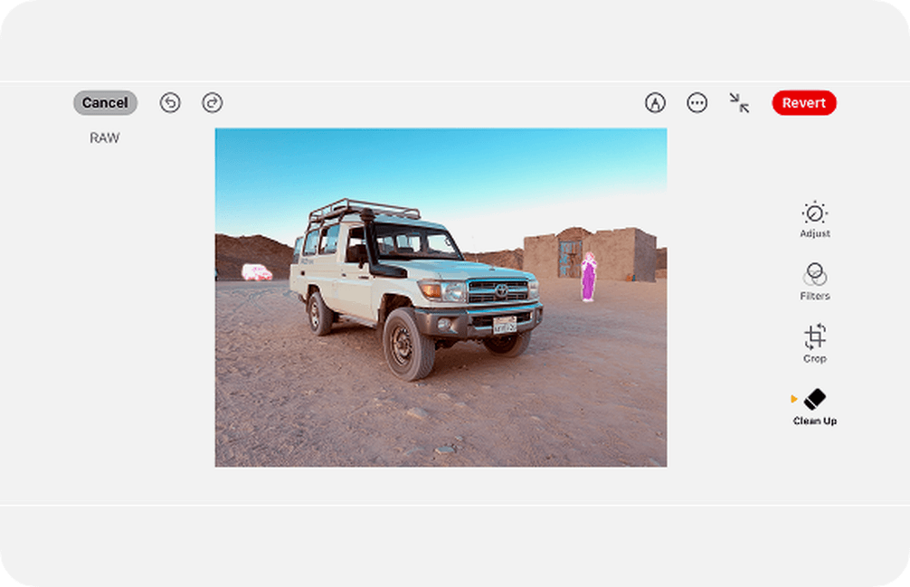A white off-road vehicle on a desert landscape, with editing tools visible on the right side of the screen.