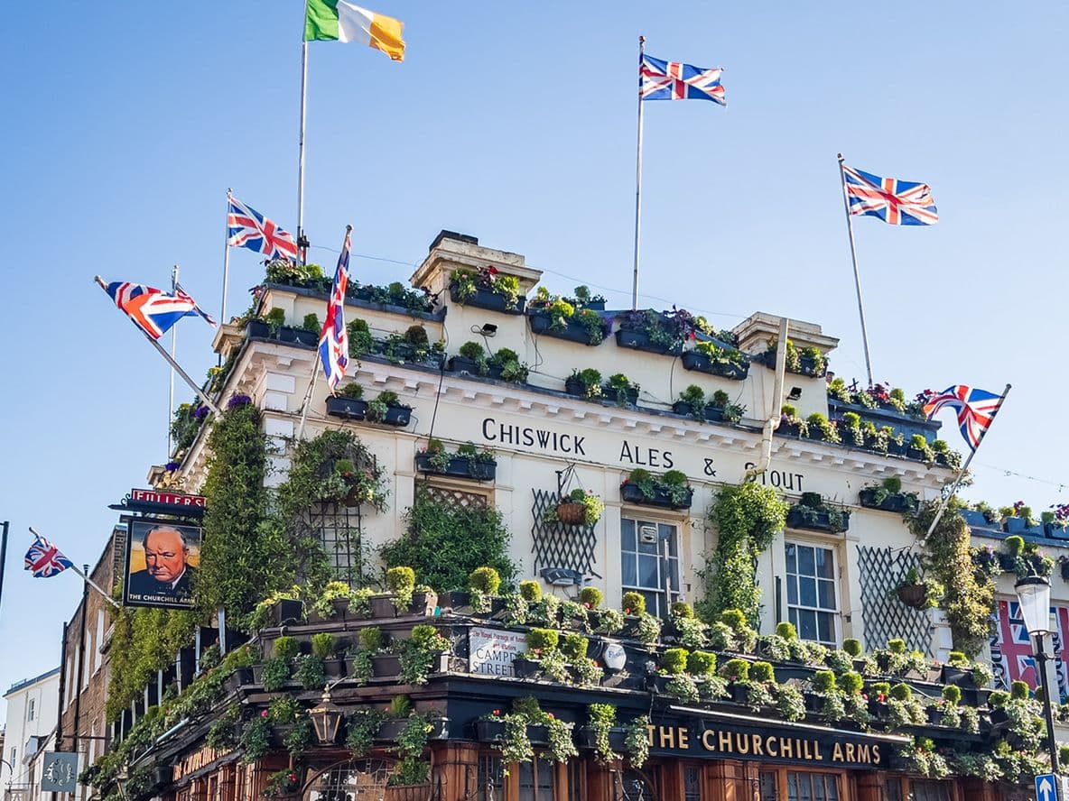 Union Jack flags decorate the roof of the Churchill Arms pub in Kensington