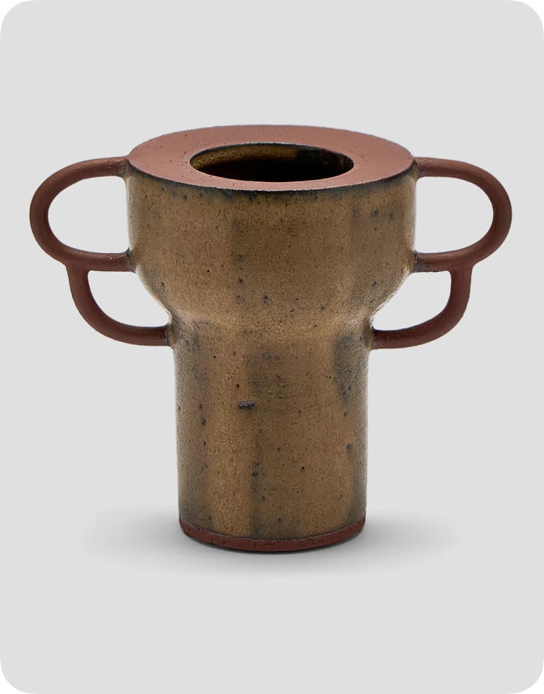 Bronze-colored ceramic vase with two symmetrical loop handles and a wide, circular opening, set against a light gray background.
